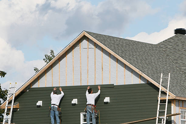Professional Emergency Siding Repair technician working in Saint Charles, IL